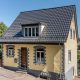 Gerenoveerde woning met FD-dakpan W6v in edelspacegrijs.