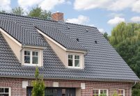 Landhuis met gevel van klinkers, dakkapellen en OVH-dakpan Z5