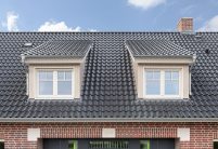 Landhuis met gevel van klinkers, dakkapellen en OVH-dakpan Z5