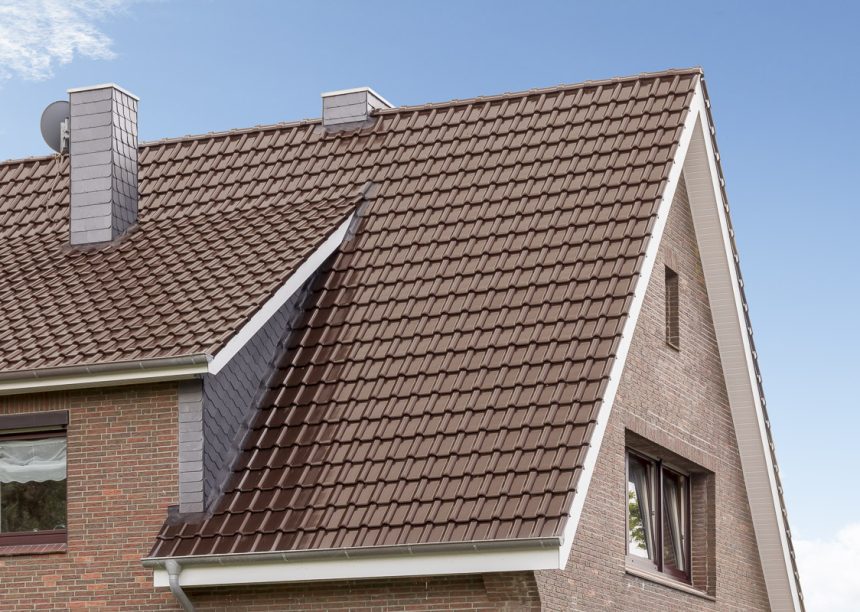 2-onder-1-kap met een sleepdakdakkapel en een bakstenen gevel